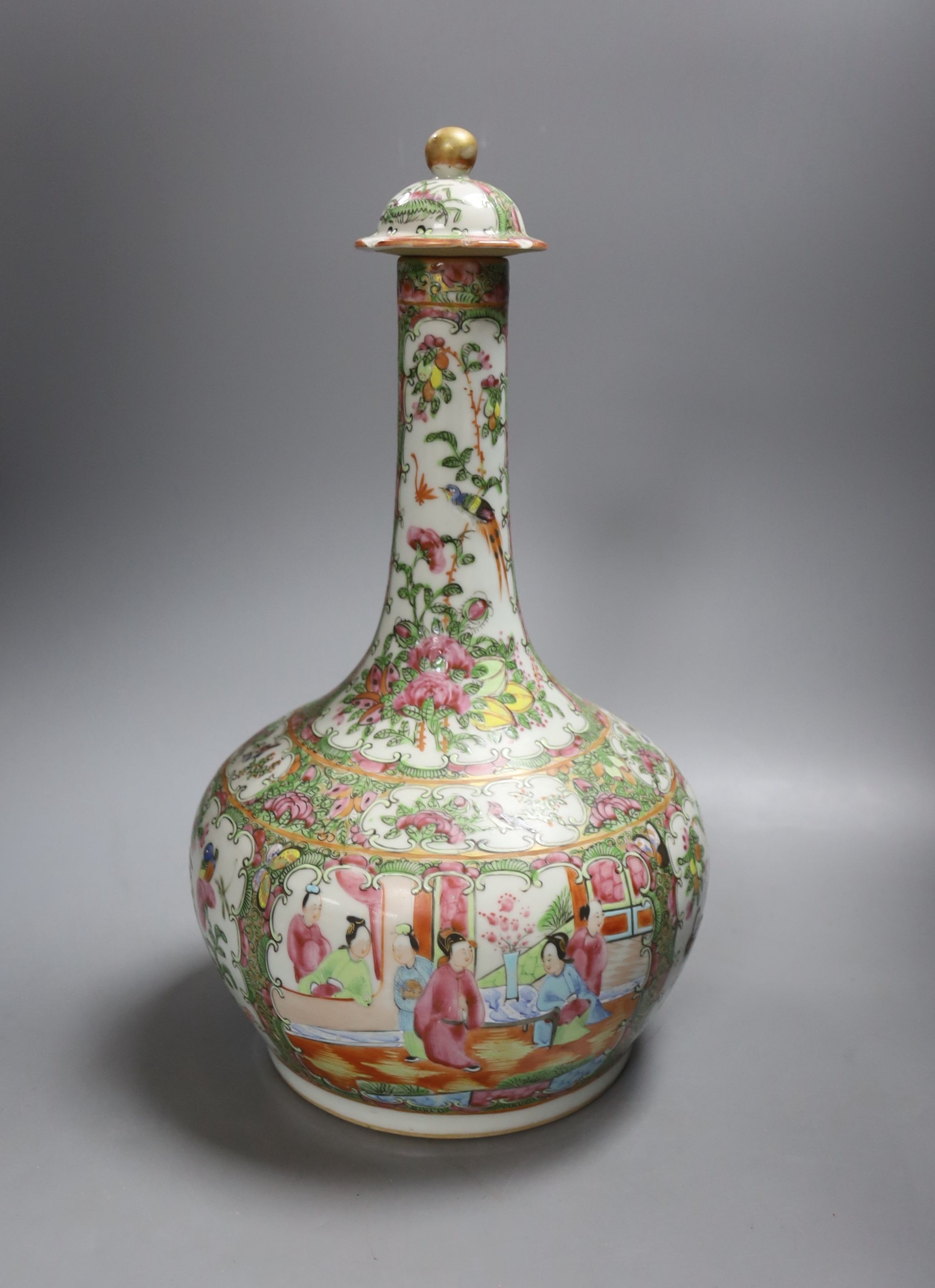 A 19th century Chinese famille rose water bottle with cover and basin, water bottle and cover 39 cms high.